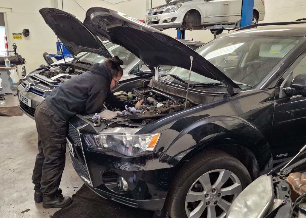 Engine work on a Mitsubishi Outlander