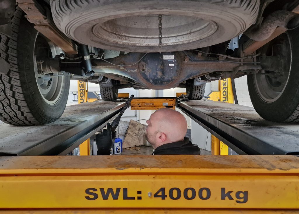 Inspecting a 4x4 from underneath on the 4-tonne ramp