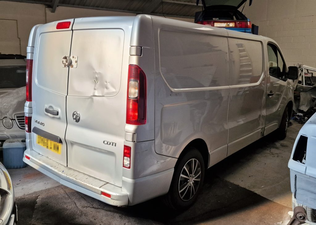 A Vauxhall Vivaro van in for work